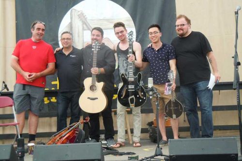 winners of the 11th annual CGF with prizes in hand, l-r: CGF founder and organizer Del Vezeau, Roger Schmidt (of Stonebridge Guitars), Blake Goodwin (1st place), Adam Crossman (2nd place), Ace Ting (3rd place) and Canadian guitar guru and festival emcee Don Ross